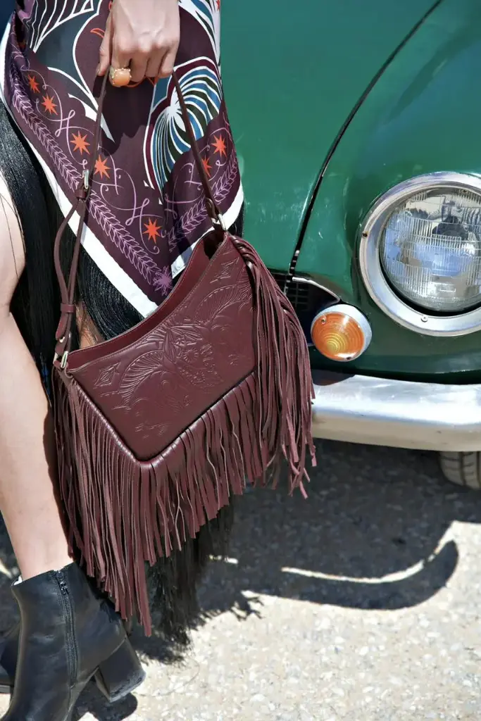 Burgundy Fringe Leather Bag	Bound In Light 